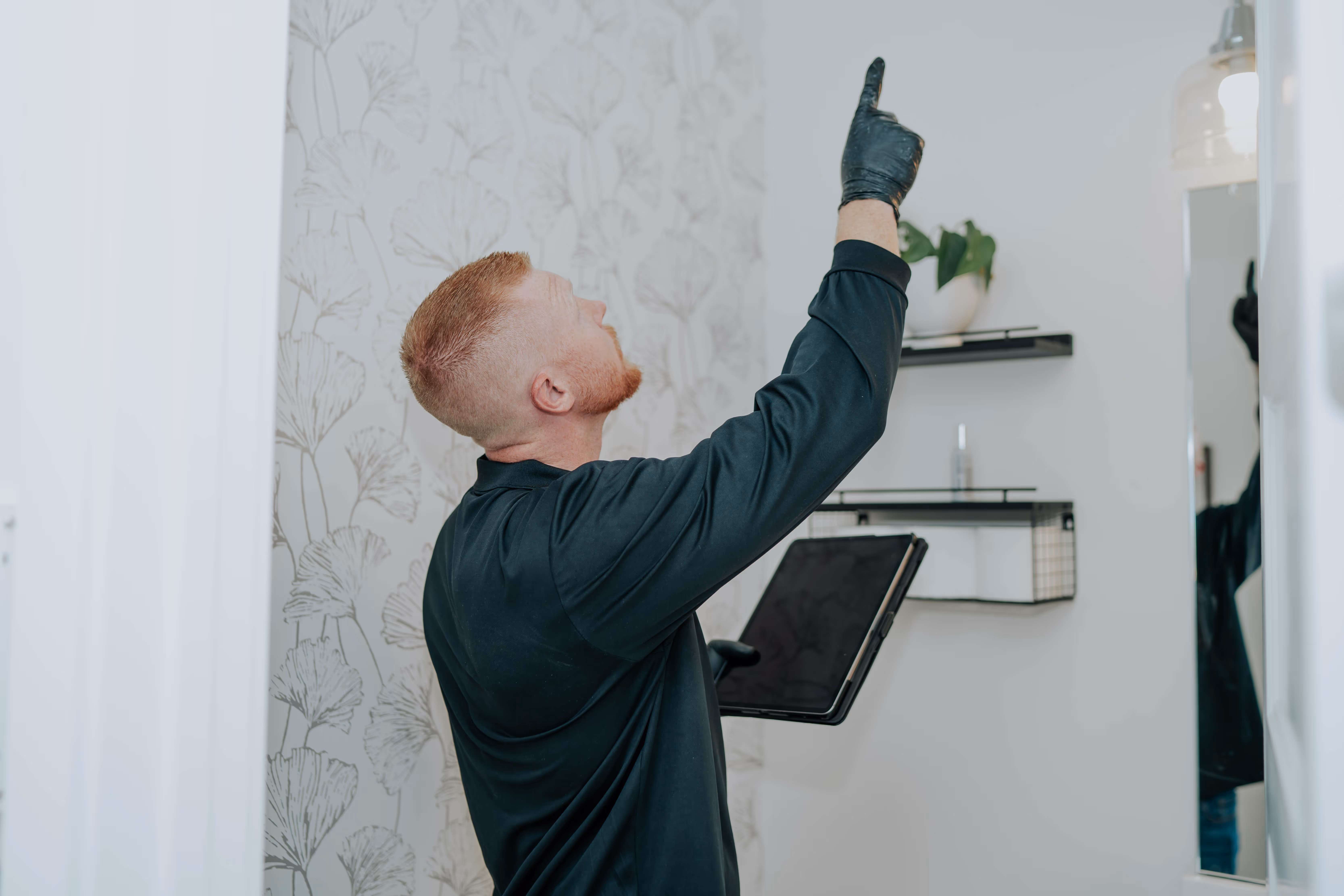 Pure Maintenance of Ohio technician conducting a full property mold inspection